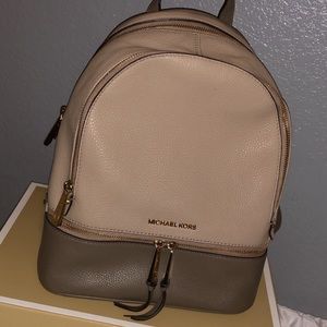 Michael Kors backpack and wallets